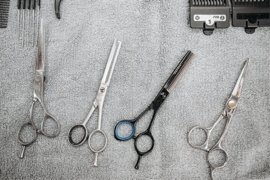 Barber scissors and tools laid out on a cloth at a Japanese barbershop